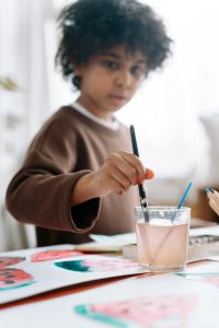 Young boy painting