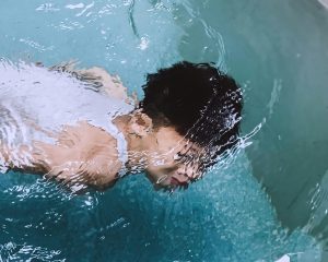 Boy swimming underwater